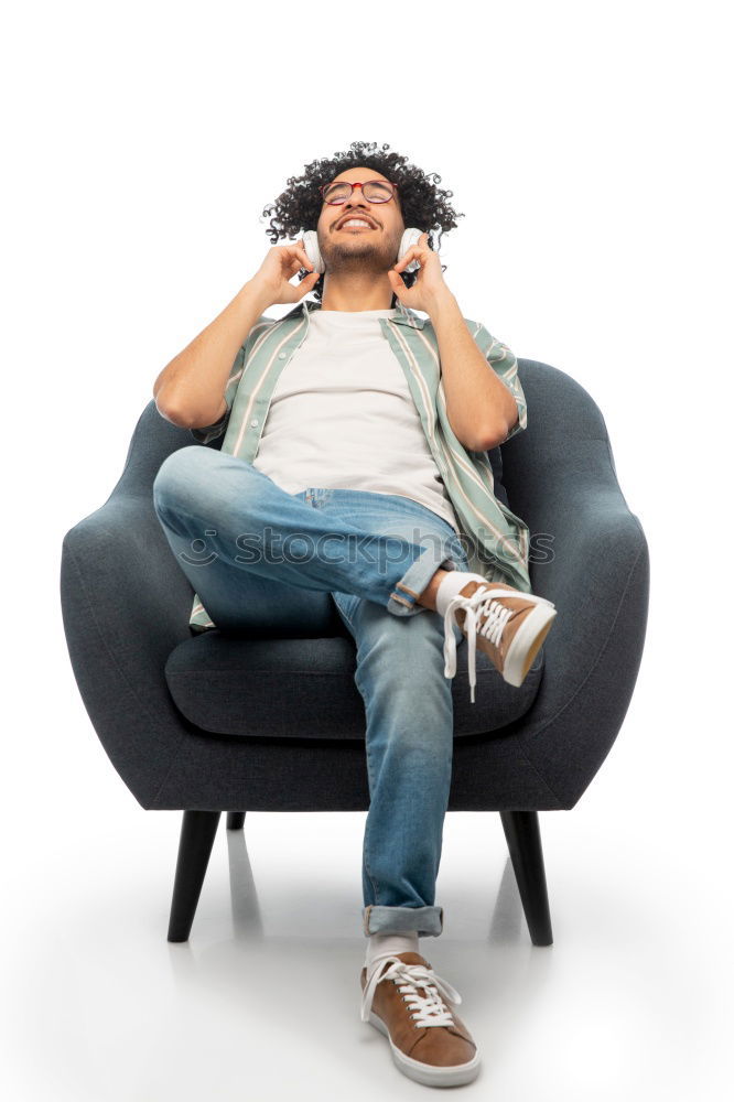 Similar – Image, Stock Photo Portrait of a young thoughtful mixed race man sitting in the sofa