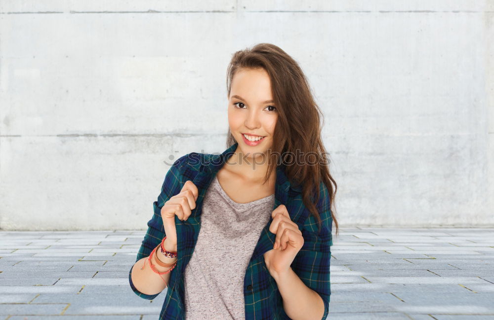 Similar – A young woman listening music on digital tablet sitting