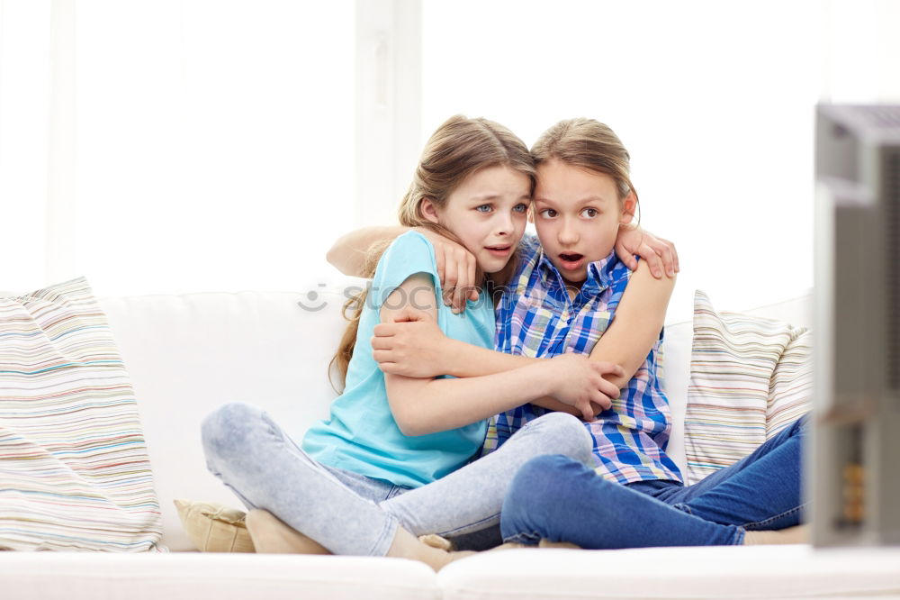 Similar – Three kids using a tablet at home