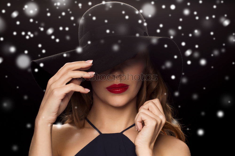 Similar – Woman with hat suits her well