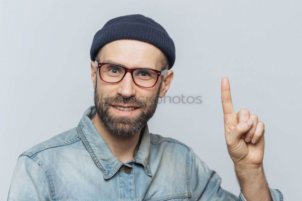 Similar – Portrait of a man with glasses and mustache with crossed arms