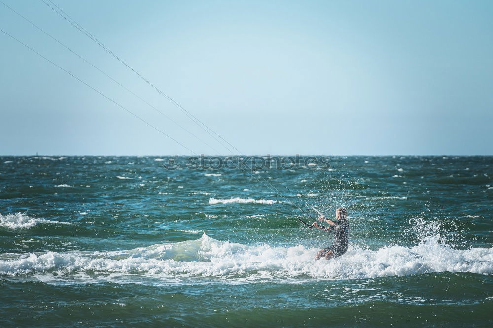 Similar – Image, Stock Photo Man in wetsuit swimming in ocean