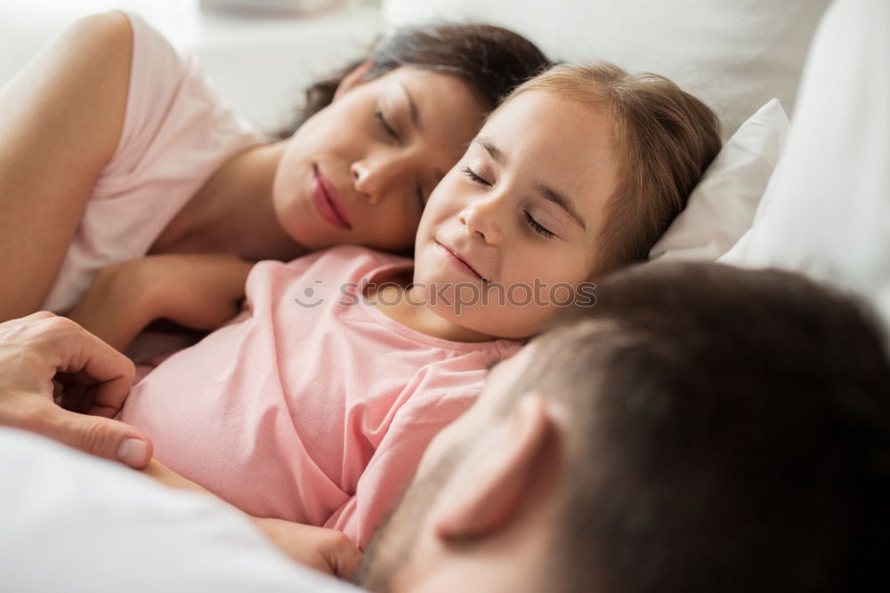 Similar – Image, Stock Photo mother and child son sleeping together in bed