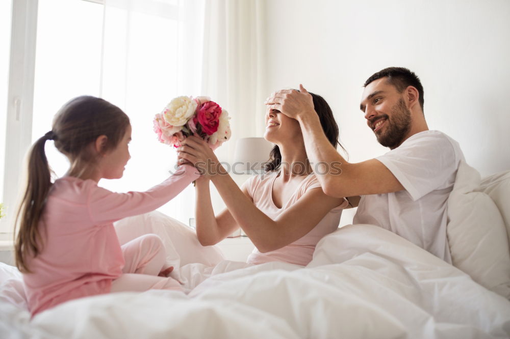 Similar – happy child boy giving flowers to mom