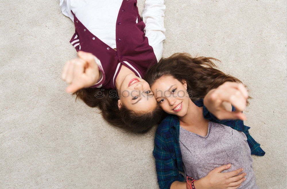 Similar – Young couple playing in front of a mirror