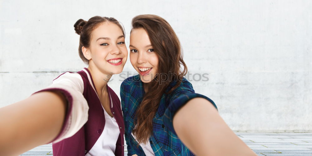 Similar – Image, Stock Photo Young adult hipster girlfriends taking selfie and pulling faces