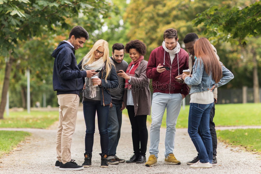 Similar – Image, Stock Photo Group of young people with smartphone and tablet computers outdoors