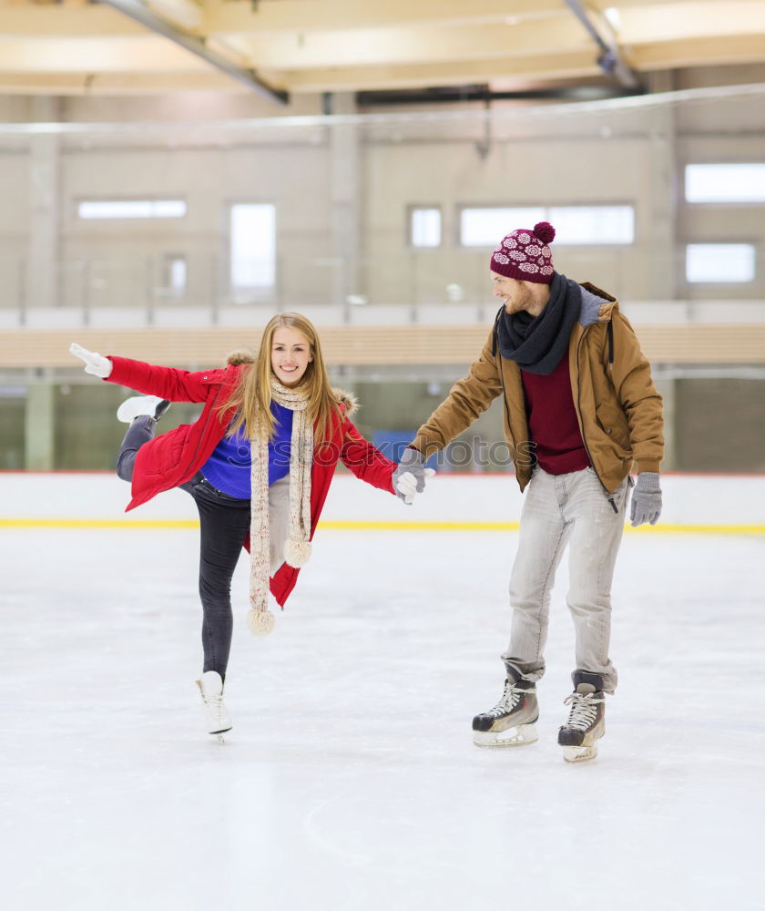 Similar – Lovely couple standing in the center of the rink