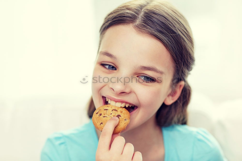 Similar – long-haired boy enjoys marble cake