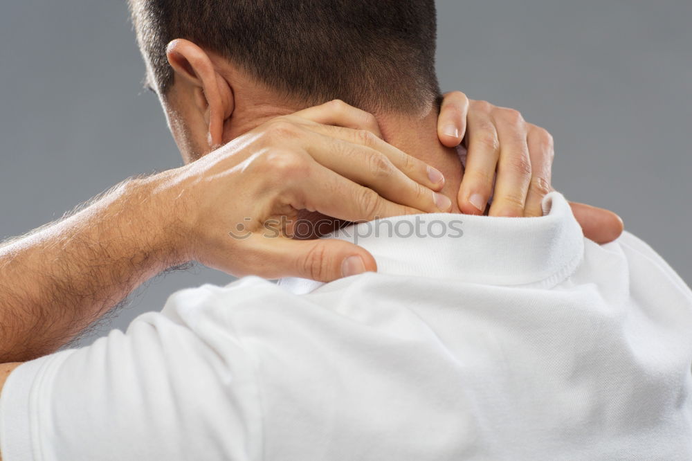 Similar – Image, Stock Photo Man suffering of thoracic vertebrae or trapezius muscle pain