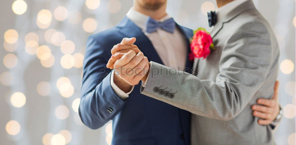 Image, Stock Photo Woman buttoning up man waistcoat