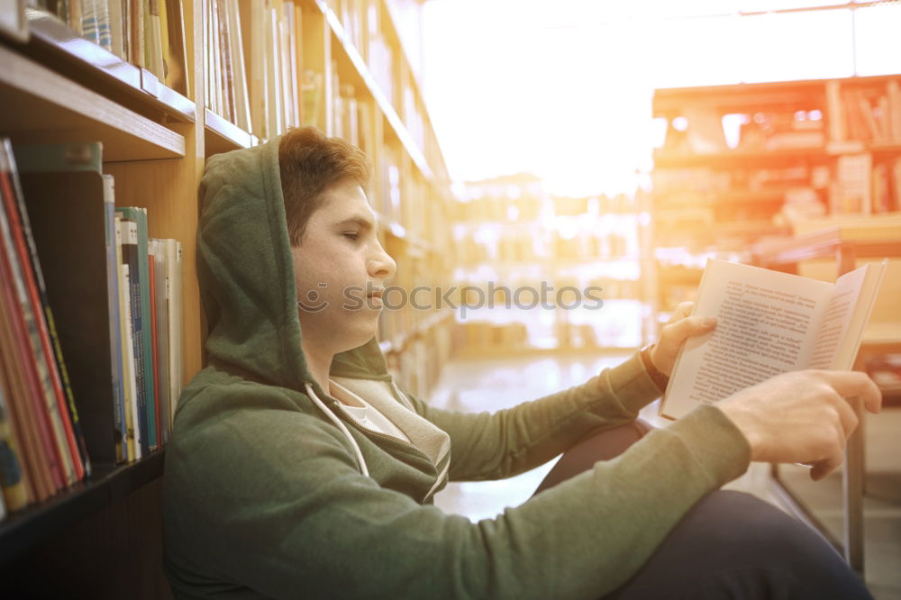 Similar – Image, Stock Photo young boy looking at tablet pc computer with frustrated look on his face