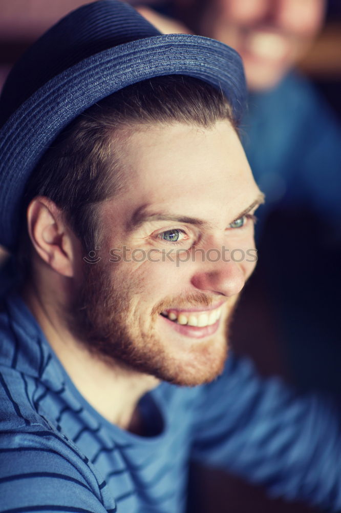 Similar – Smiling young guy in hat