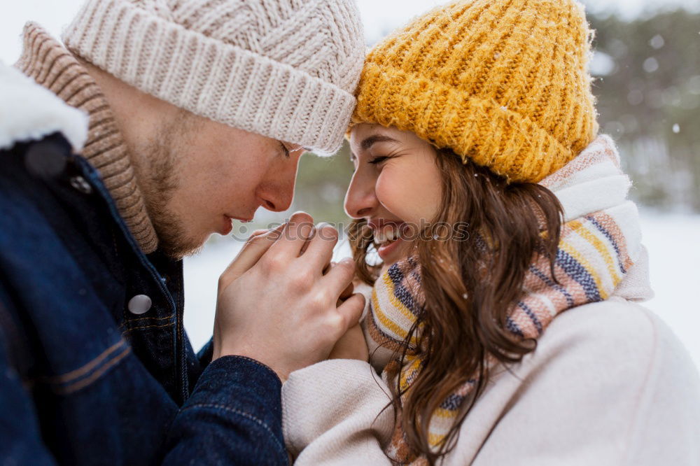 Similar – Young couple embracing under umbrella in a rainy day