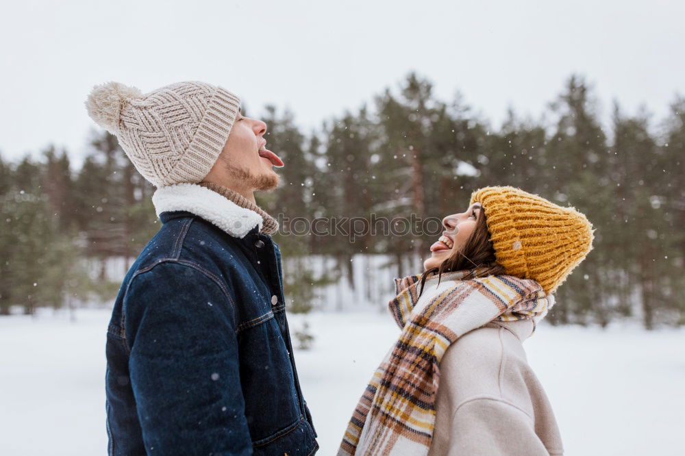 Similar – Image, Stock Photo Couple having fun in winter forest