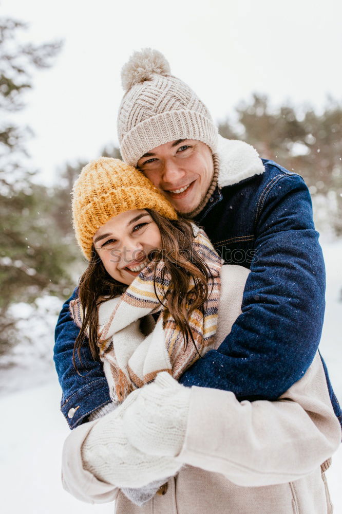 Similar – Image, Stock Photo Couple having fun in winter forest