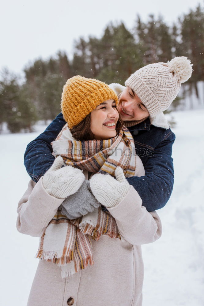 Similar – Image, Stock Photo Couple having fun in winter forest