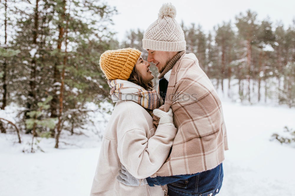 Similar – Image, Stock Photo winter portrait of happy couple playing in snowy forest