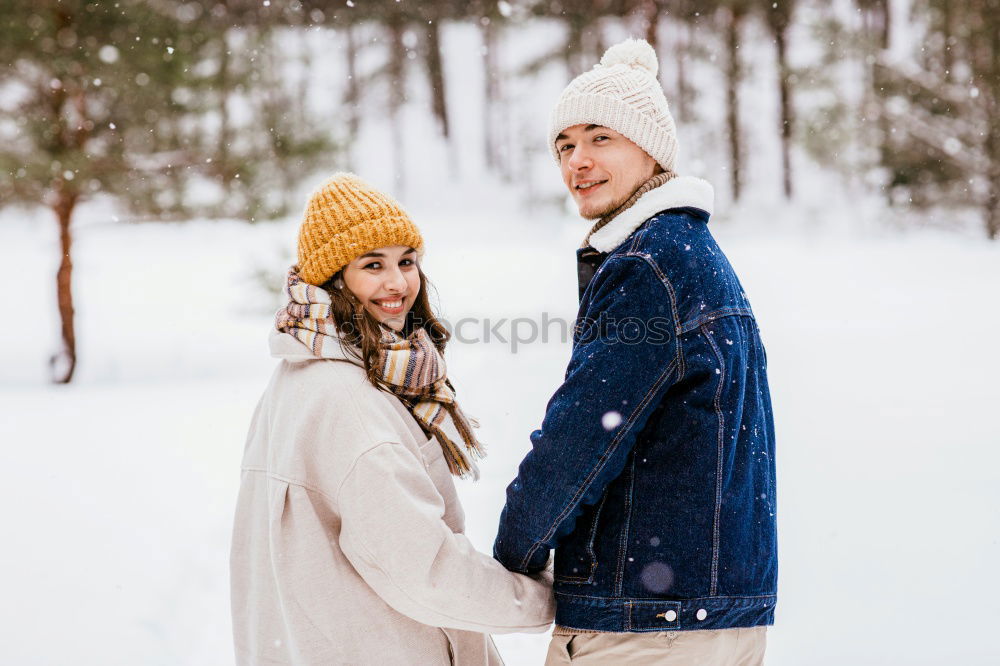 Image, Stock Photo happy young couple walking in winter snowy forest