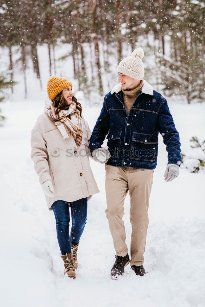 Similar – Image, Stock Photo Couple having fun in winter forest