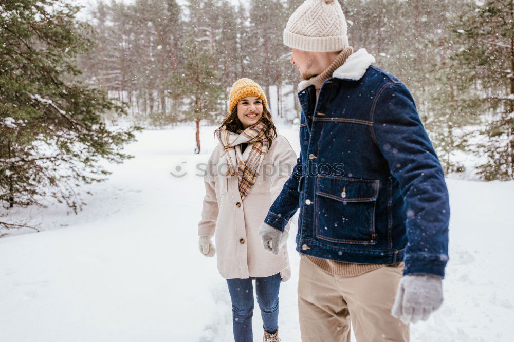 Similar – Image, Stock Photo Lifestyle winter portrait of romantic couple walking