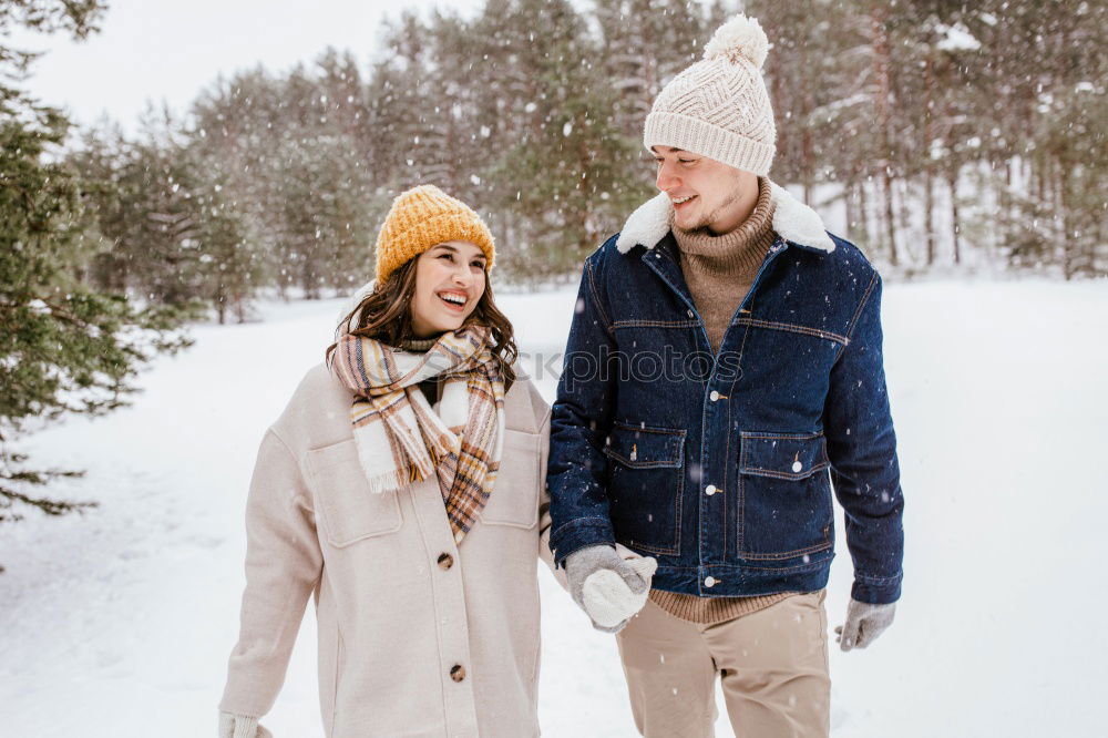 Similar – Image, Stock Photo winter portrait of happy couple playing in snowy forest