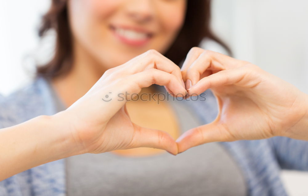 Similar – Closeup of woman’s hands using a smartphone