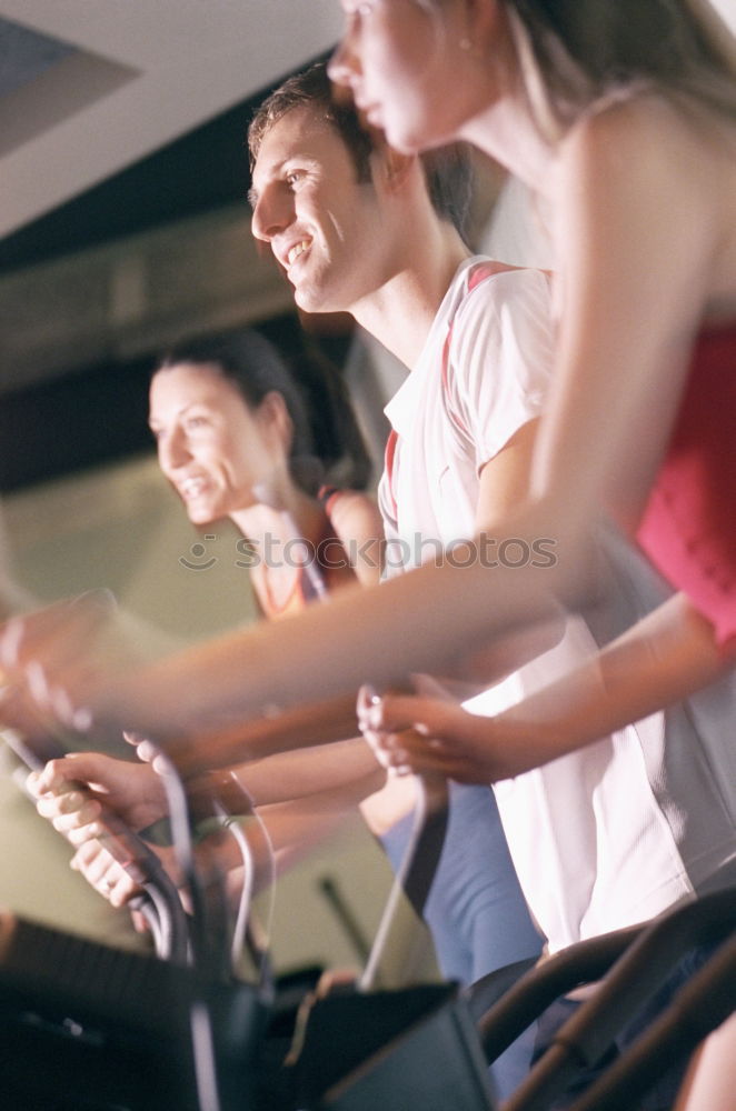 Similar – Image, Stock Photo Attractive Woman with headphones on treadmill in the gym