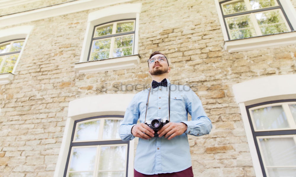 Similar – Image, Stock Photo Young handsome trendy man with coat posing with an old wall background