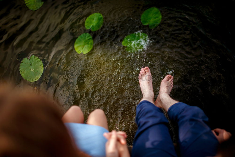 Similar – Summer feet at the lake