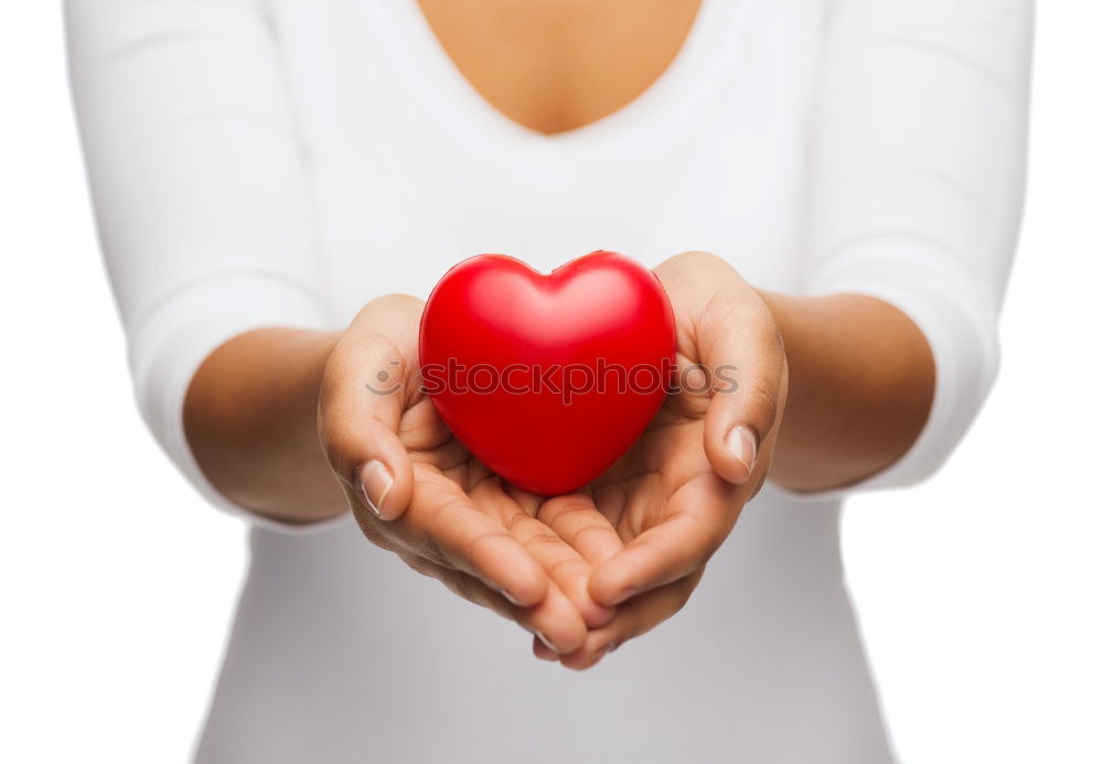 Similar – A rock with the word love written on it.