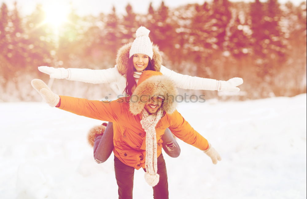 Similar – Friends playing snowballs in woods