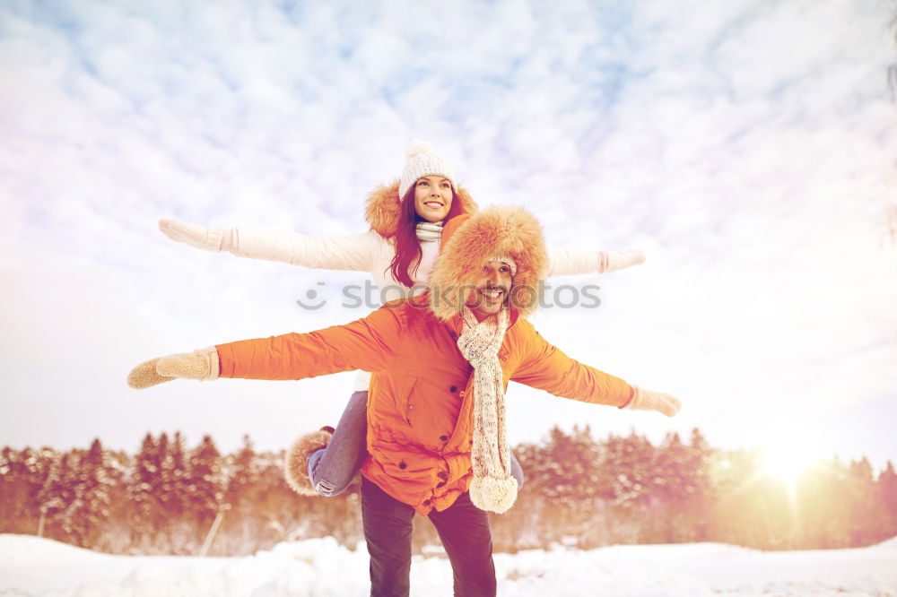 Similar – Friends playing snowballs in woods