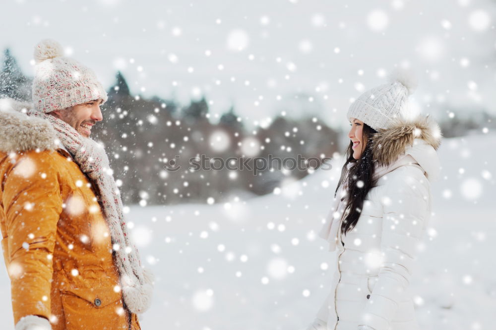 Mother and her daughter are spending time together in winter