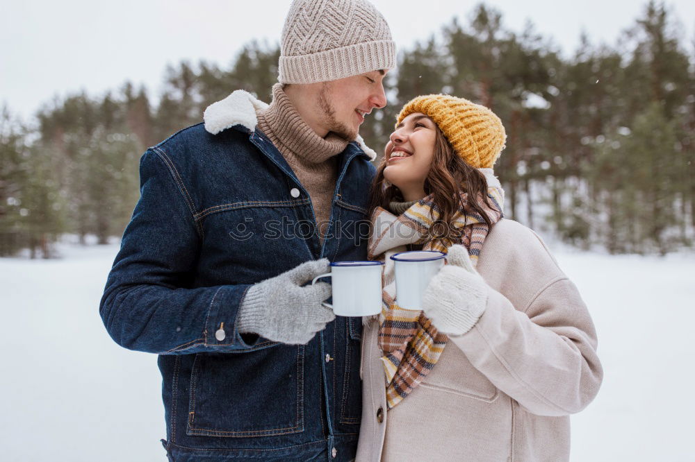 Similar – Image, Stock Photo Couple having fun in winter forest