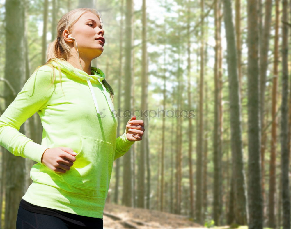 Similar – Image, Stock Photo Pretty fit young woman jogging in woodland