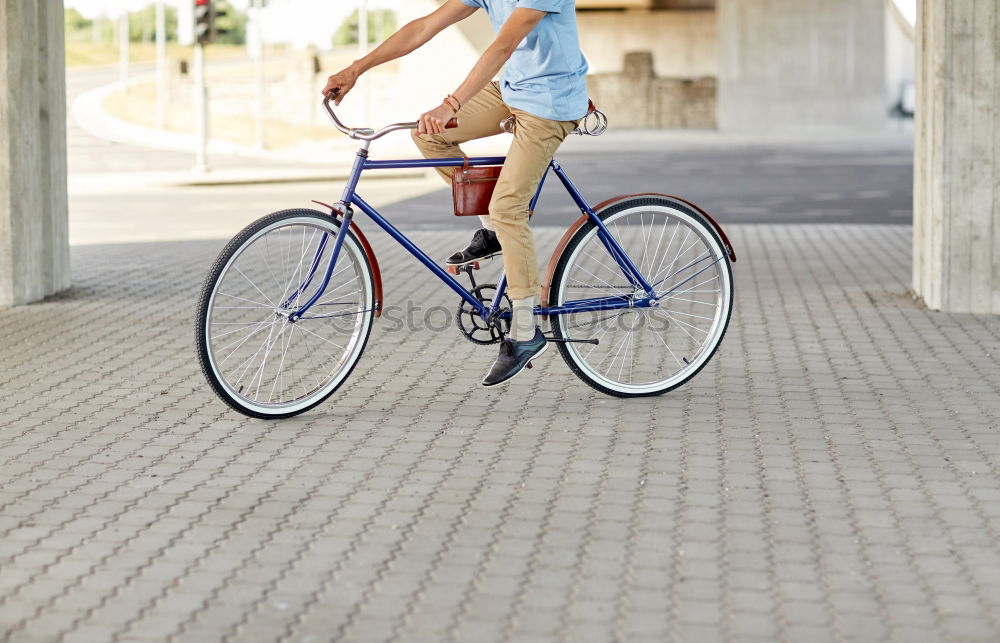 Similar – A Stylish business man with mobile phone with retro bicycle