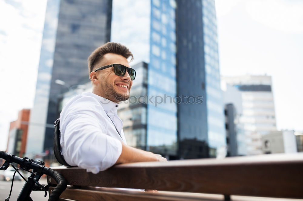 Similar – Image, Stock Photo Young man with mobile phone and fixed gear bicycle.