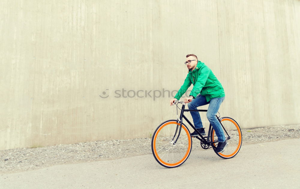 Similar – Image, Stock Photo Little kid riding his bicycle on city street