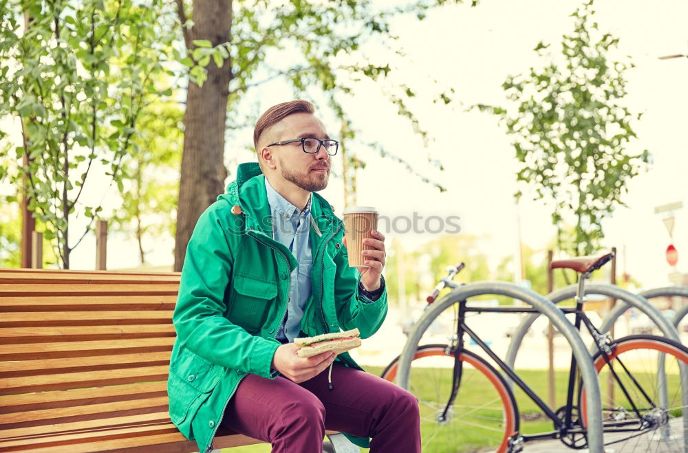 Similar – Image, Stock Photo Young man with mobile phone and fixed gear bicycle.