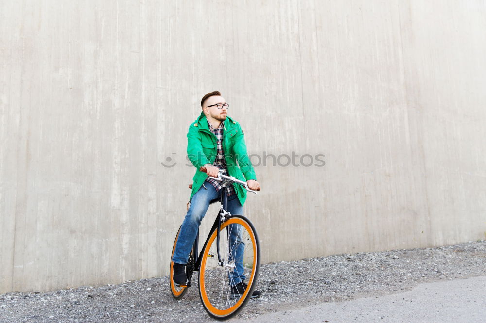 Similar – Image, Stock Photo Little kid riding his bicycle on city street