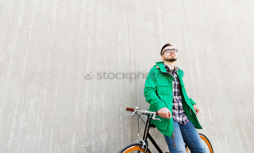 Similar – Image, Stock Photo Little kid riding his bicycle on city street