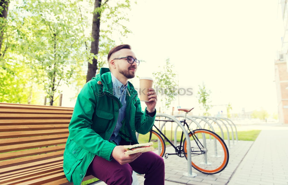 Similar – Image, Stock Photo Young man with mobile phone and fixed gear bicycle.