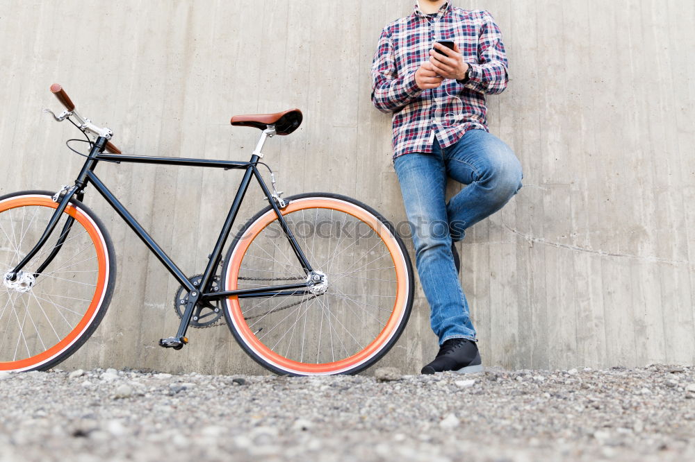 Similar – Handsome afro man relaxing near his bike.