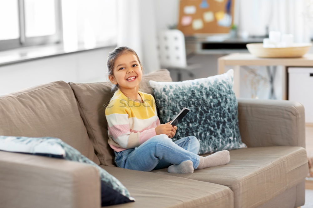 Similar – Image, Stock Photo African girl sits next to her teddy bear at home