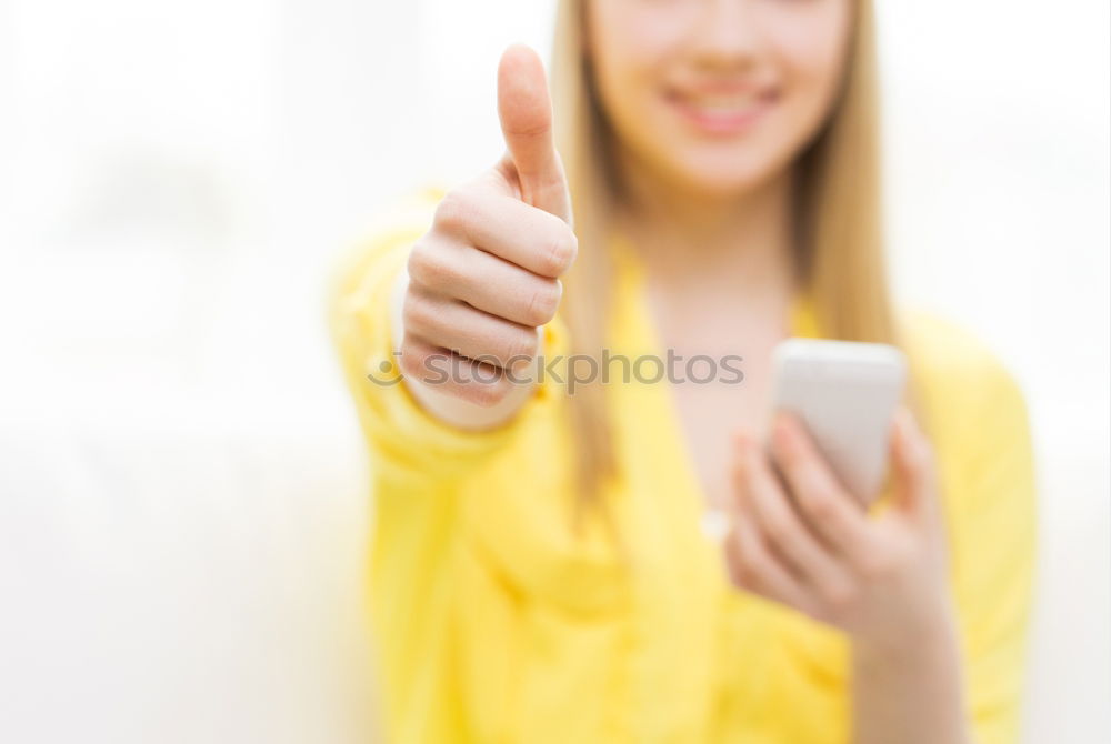 Similar – Young blonde girl with her mobile phone