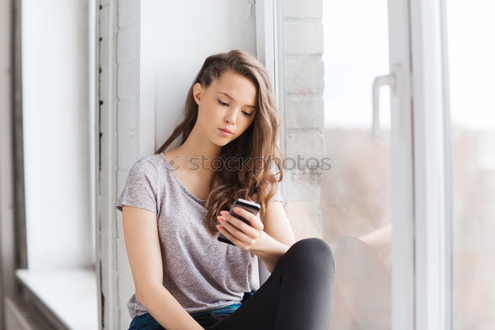 Similar – Image, Stock Photo Young influencer woman using her smartphone