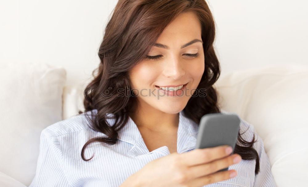 Similar – Image, Stock Photo young woman sitting at home sofa using mobile phone