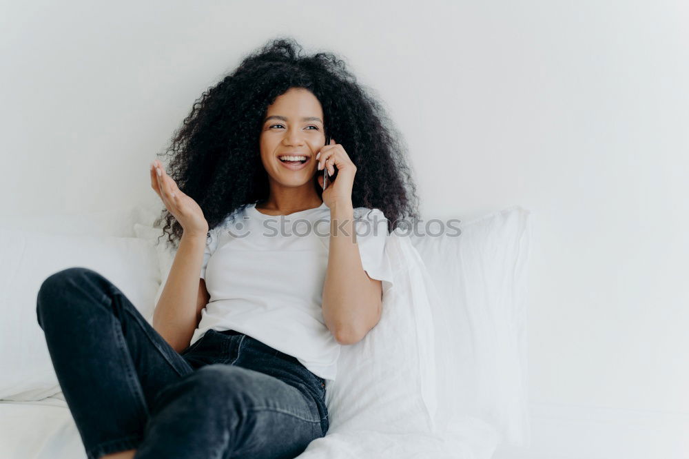 Similar – Image, Stock Photo Happy beautiful young black woman seating in the bed smiling