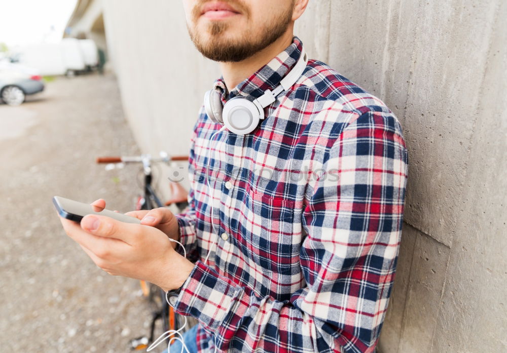 Similar – Image, Stock Photo Young man with mobile phone and fixed gear bicycle.